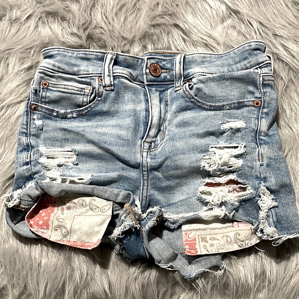 Denim shorts. Size: 4. American eagle. One a handful of times. 75% cotton